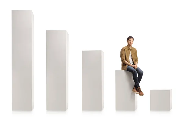 Young Casual Man Sitting Column Chart Smiling Isolated White Background — Stock Photo, Image