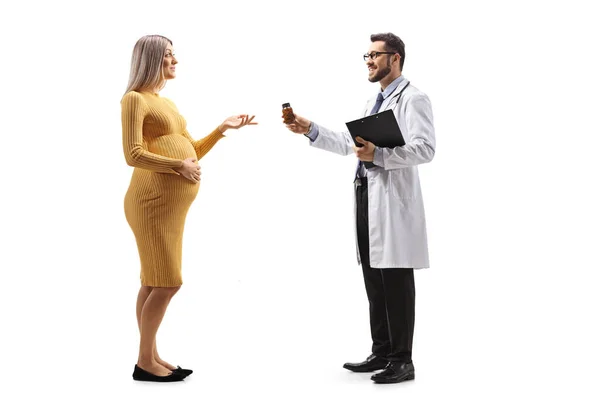 Full Length Profile Shot Doctor Giving Medicines Pregnant Woman Isolated — Stock Photo, Image