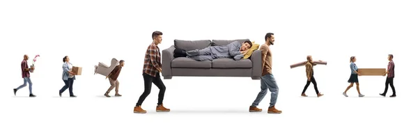 Junge Männer Tragen Einen Mann Schlafanzug Auf Einem Sofa Und — Stockfoto