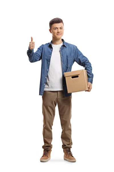 Retrato Comprimento Total Jovem Com Uma Caixa Papelão Mostrando Gesto — Fotografia de Stock