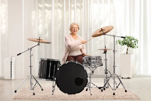 Cheerful Elderly Woman Playing Drums Home — Stock Photo, Image