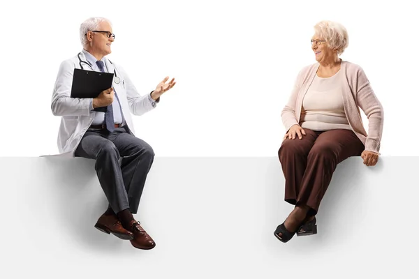 Full Length Shot Mature Doctor Sitting Blank Panel Talking Elderly — Stock Photo, Image