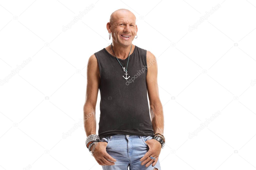 Bold man with ripped jeans and earings isolated on white background