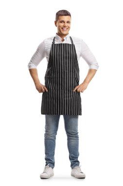 Beyaz arka planda izole edilmiş önlük giyen yakışıklı bir adamın tam boy portresi.