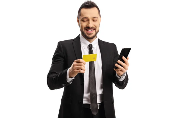 Zakenman Met Een Smartphone Een Creditcard Geïsoleerd Witte Achtergrond — Stockfoto