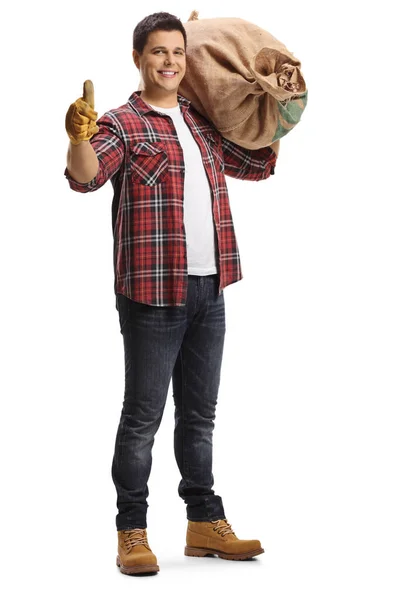 Full Length Portrait Young Farmer Carrying Burlap Sack His Shoulder — Stock Photo, Image