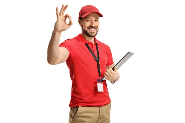 Vrolijke Mannelijke Winkel Assistent Gebaren Teken Met Hand Het Houden — Stockfoto