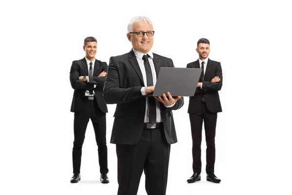 Mature Businessman Laptop Two Male Coworkers Behing Isolated White Background — Stock Photo, Image
