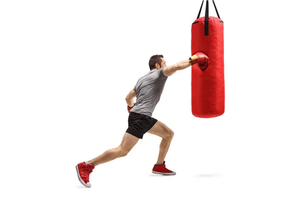 Homem Forte Exercitando Perfurando Saco Boxe Isolado Fundo Branco — Fotografia de Stock