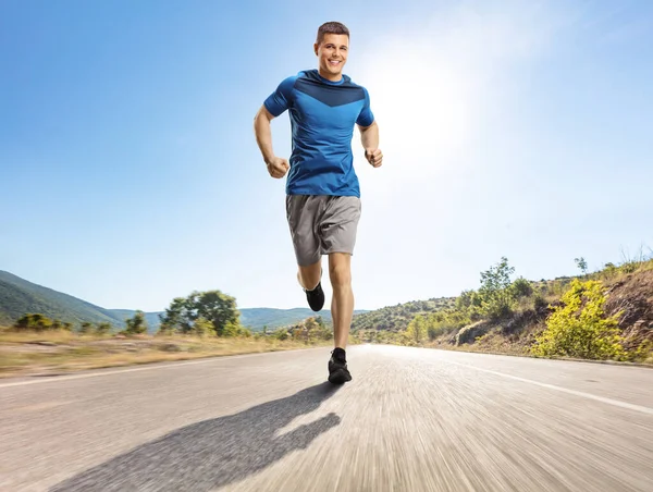 Full Length Portrait Young Man Running Outdoors Open Road — Stock Photo, Image