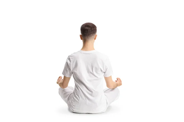 Achteraanzicht Shot Van Een Man Witte Kleren Zitten Oefenen Yoga — Stockfoto