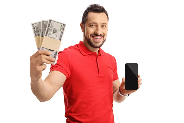 Человек Держит Деньги Показывает Мобильный Телефон Изолирован Белом Фоне — стоковое фото