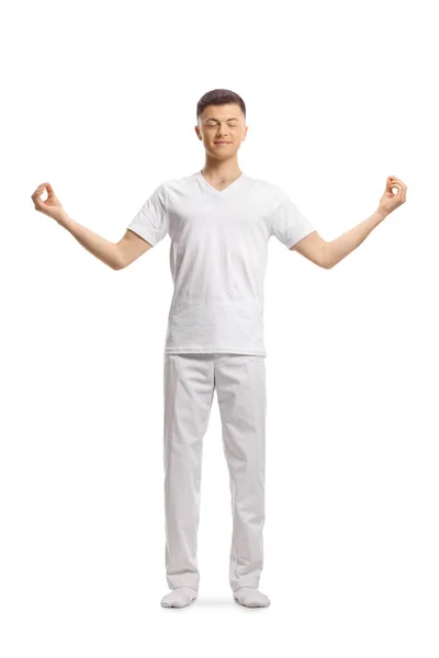 Full Length Portrait Young Man White Clothes Standing Meditating Isolated — Stock Photo, Image