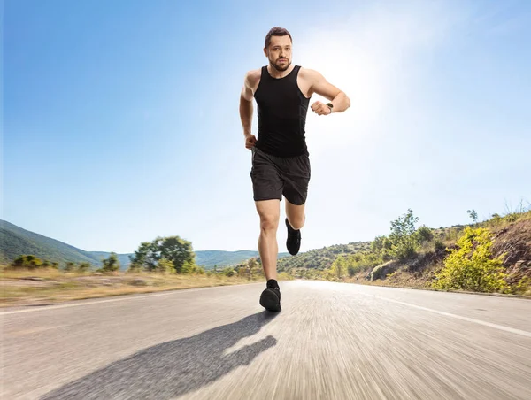 Full Length Portrait Fit Man Smartwatch Running Open Asphalt Road — Stock Photo, Image