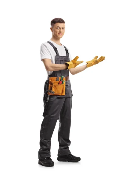 Full Length Portrait Young Repairman Tool Belt Gesturing Welcome Isolated — Stock Photo, Image