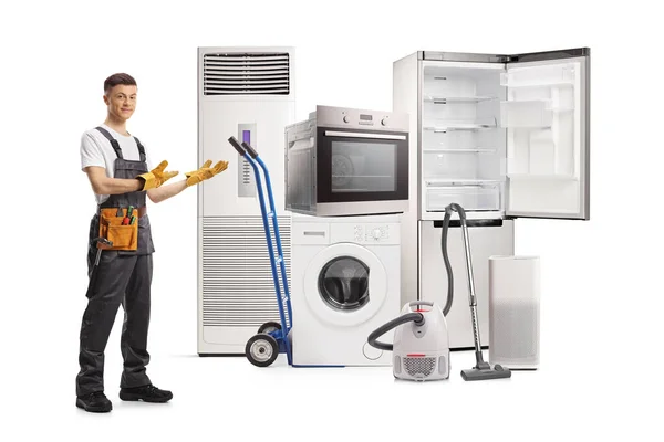Retrato Comprimento Total Jovem Reparador Mostrando Eletrodomésticos Isolados Fundo Branco — Fotografia de Stock