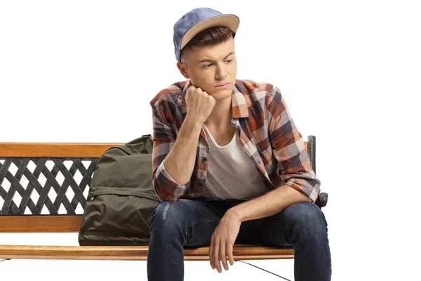 Zamyślony Mężczyzna Student Siedzi Ławce Patrząc Daleko Odizolowany Białym Tle — Zdjęcie stockowe
