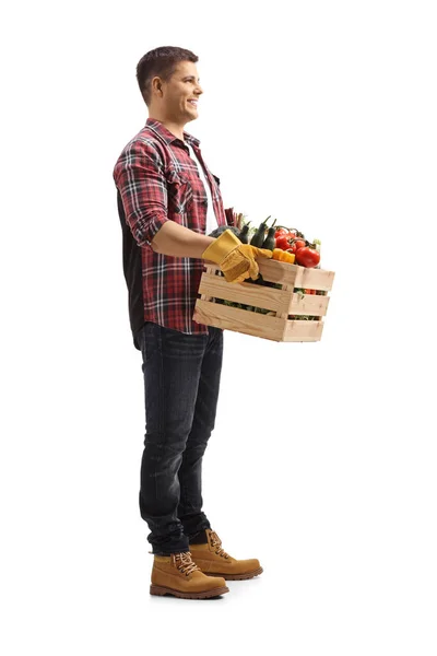 Full Length Shot Farmer Carrying Crate Vegetables Smiling Isolated White — Stock Photo, Image