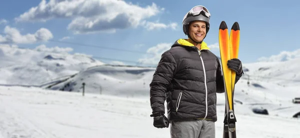 Man Holding Skiing Equipment Snowy Mountain Slopes Smiling Camera — Stock Photo, Image