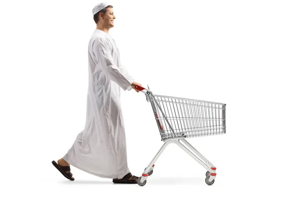 Full Length Profile Shot Young Muslim Man Walking Pushing Empty — Stock Photo, Image