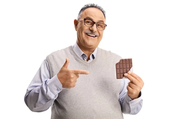 Happy Mature Man Holding Chocolate Pointing Isolated White Background — 图库照片