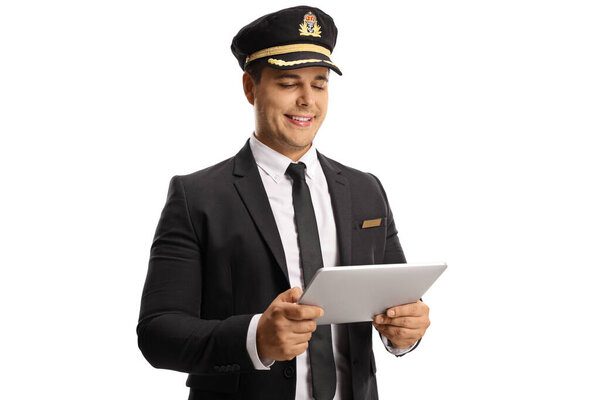 Young chauffeur using a digital tablet isolated on white background