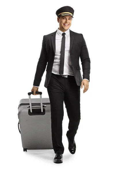 Full Length Portrait Pilot Uniform Walking Camera Pulling Suitcase Isolated — Stockfoto