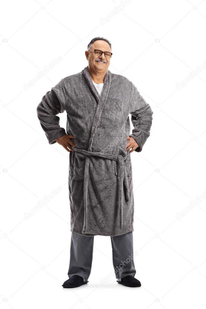 Full length portrait of a corpulent mature man wearing a grey robe isolated on white background