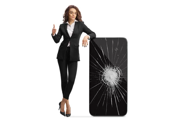 Businesswoman Showing Thumbs Leaning Smartphone Cracked Screen Isolated White Background — Stock Photo, Image
