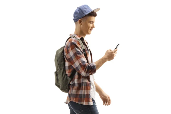 Student Backpack Cap Walking Looking His Mobile Phone Isolated White — Stock Photo, Image