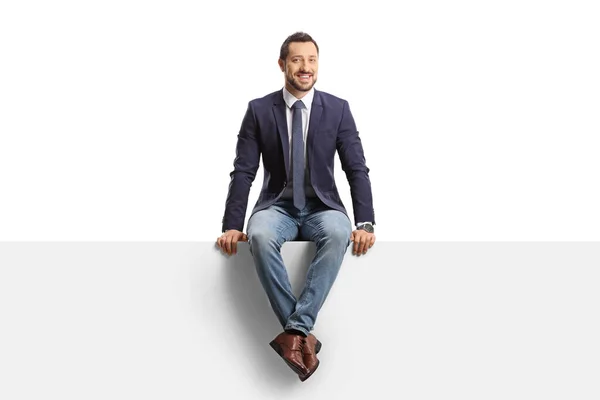 Full Length Portrait Man Jeans Suit Sitting Blank Panel Isolated — Stock Photo, Image