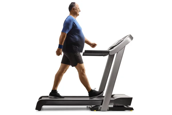 Full Length Profile Shot Mature Man Walking Treadmill Isolated White — Stock Photo, Image