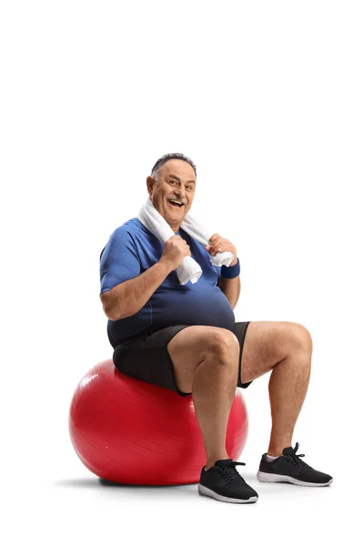 Happy Mature Man Sitting Fitness Ball Towel His Neck Isolated — ストック写真