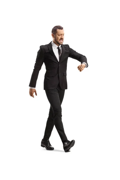 Businessman Walking Fast Checking Time Isolated White Background — Stock Photo, Image