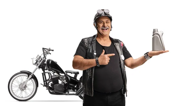 Mature Man Biker Chopper Holding Engine Oil Pointing Isolated White — Stock Photo, Image