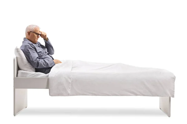 Profile Shot Mature Man Bed Holding His Head Isolated White — Stock Photo, Image