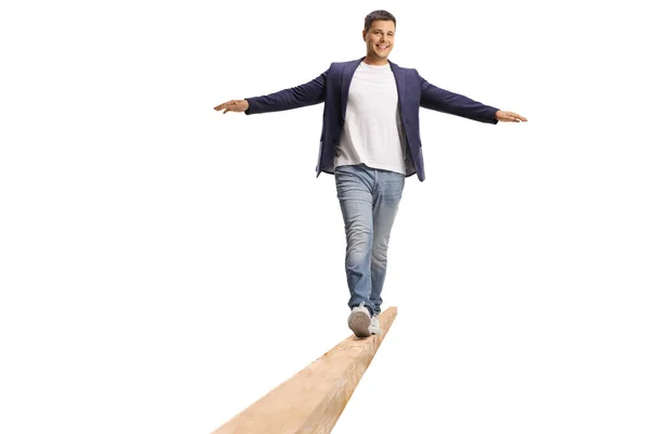 Full Length Portrait Young Man Walking Wooden Beam Isolated White — Stock Photo, Image