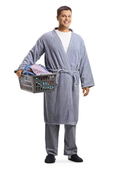 Full Length Portrait Young Man Bathrobe Holding Laundry Basket Isolated — Stock Photo, Image