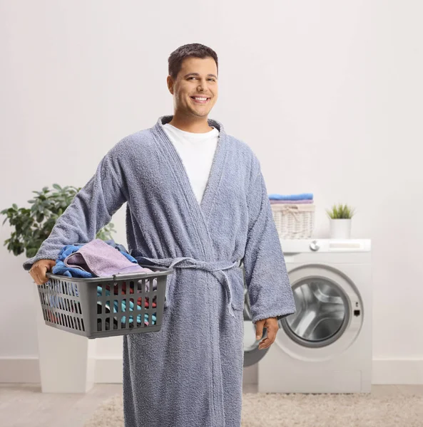 Man Bathrobe Holding Laundry Basket Bathroom — Stock Photo, Image