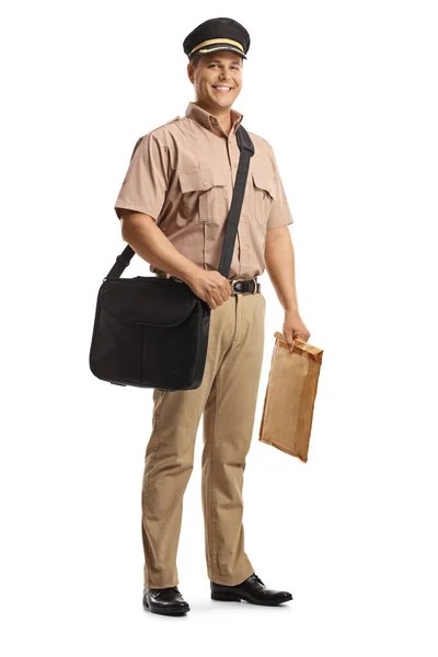 Full Length Portrait Smiling Mailman Uniform Carrying Bag Package Isolated — Stock Photo, Image