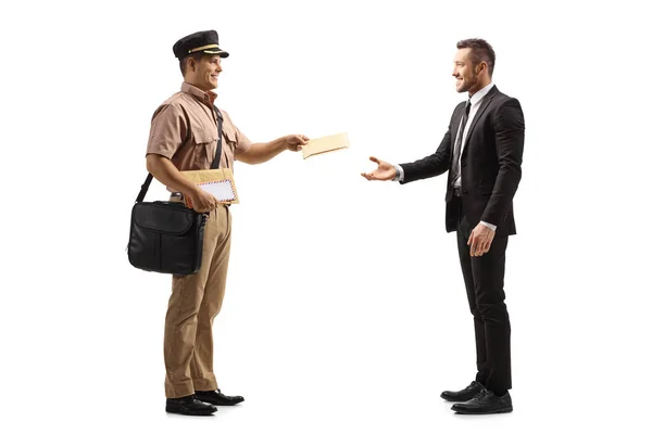 Joven Cartero Con Uniforme Entregando Una Carta Hombre Negocios Aislado —  Fotos de Stock