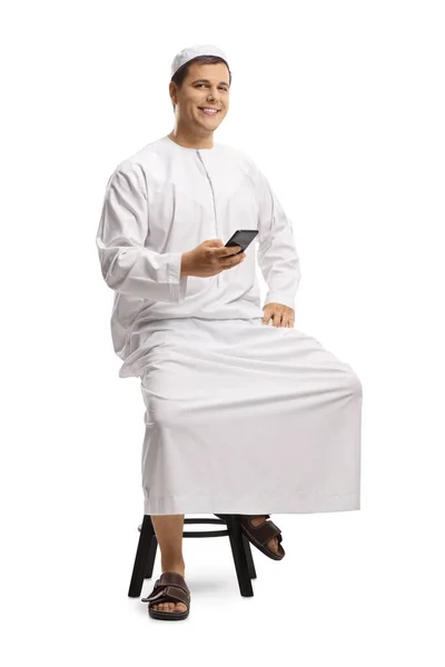 Full Length Portrait Young Man Ethnic Wear Sitting Chair Holding — Stock Photo, Image