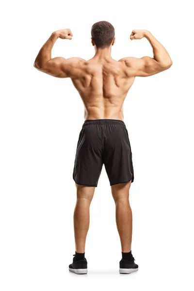 Achteraanzicht Van Een Shirtloze Musuclar Man Die Buigt Spieren Geïsoleerd — Stockfoto