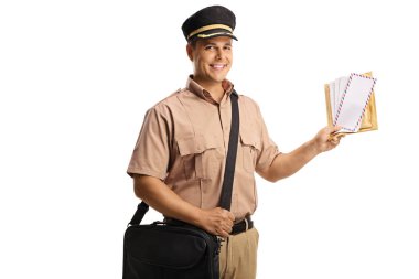 Smiling mailman carrying a bag and holding letters isolated on white background