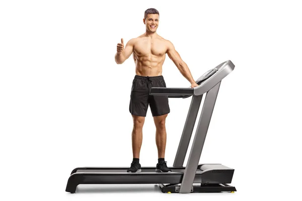 Full Length Portrait Shirtless Young Man Standing Treadmill Showing Thumbs — Stock Photo, Image