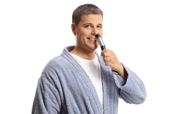 Man Bathrobe Using Nose Trimmer Isolated White Background — Stock Photo, Image