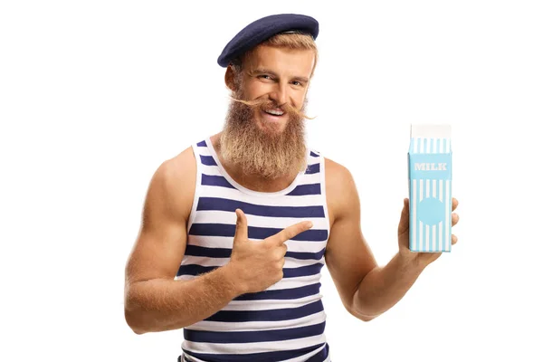 Man Met Baard Met Een Kartonnen Pak Melk Wijzend Een — Stockfoto