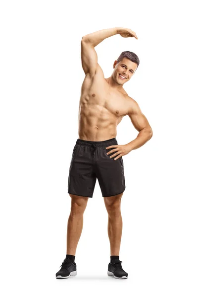 Full Length Portrait Fit Man Exercising Shirtless Stretching His Arm — Stock Photo, Image