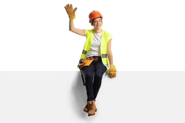 Full Length Portrait Cheerful Female Engineer Sitting Blank Panel Waving — Stock Photo, Image