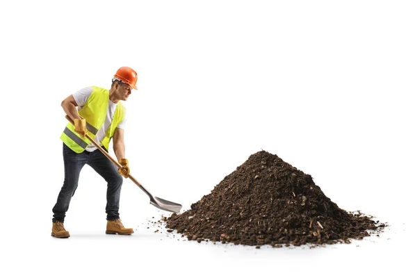 Trabajador Construcción Con Chaleco Casco Excavando Tierra Con Una Pala — Foto de Stock